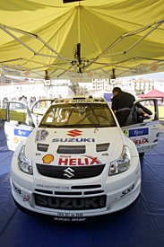 The Suzuki SX4 WRC in the Corsica service park